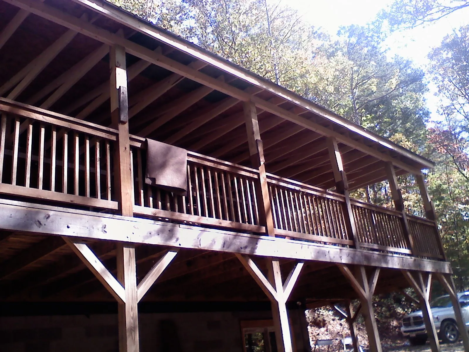 Timber framing under a new elevated porch and deck — Roof Leak Repair in Whitewater by Roofing Brothers